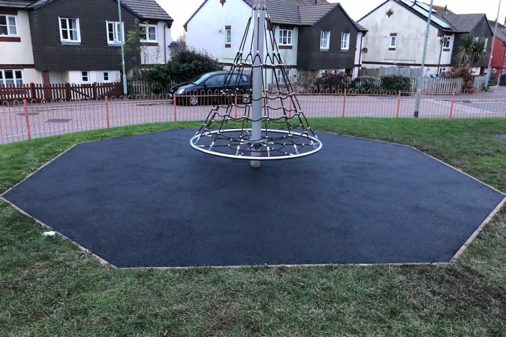 Rubber surfacing in playground